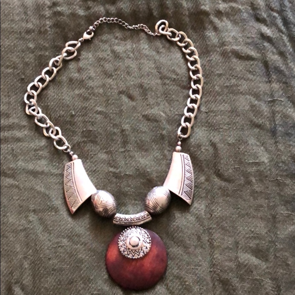 Filigree work  necklace on metal  wood medallion